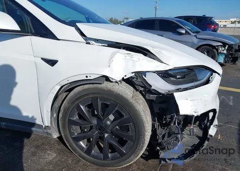 2023 Tesla Model X Dual Motor All-Wheel Drive/Standard Range из США, поврежденный, VIN 7SAXCAE58PF410284